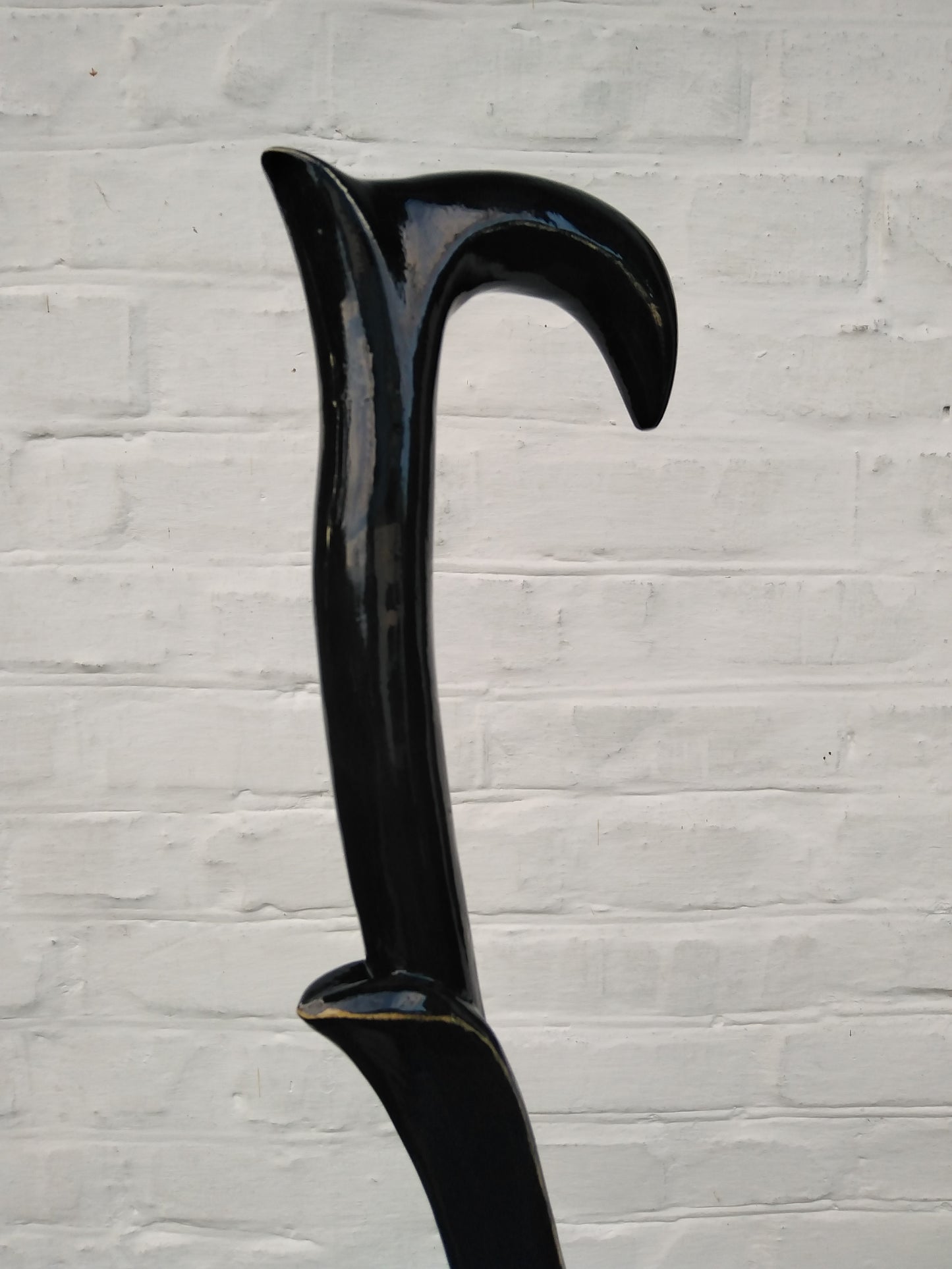 Carved unique wooden cane in the form of a plant