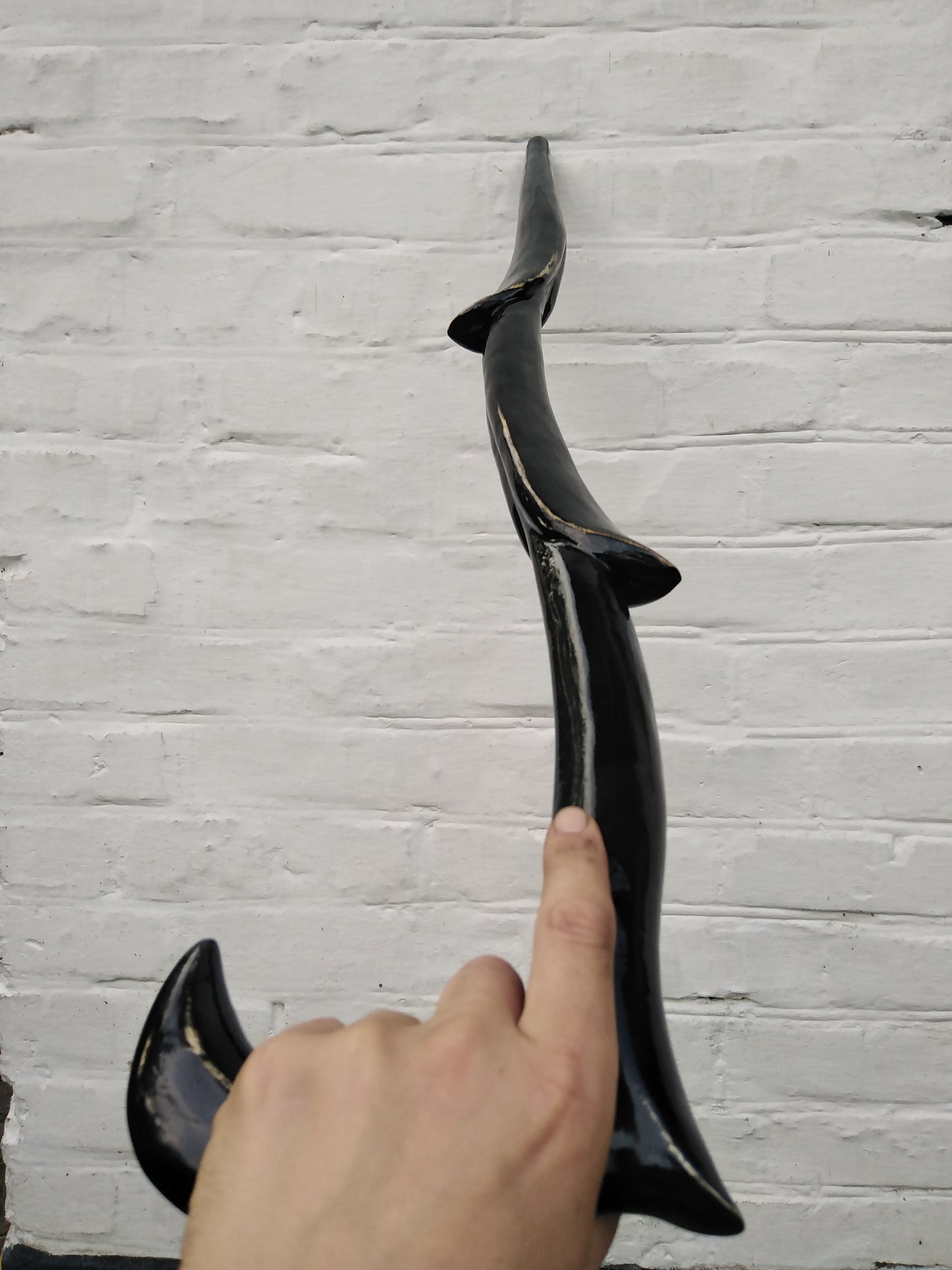 Carved unique wooden cane in the form of a plant