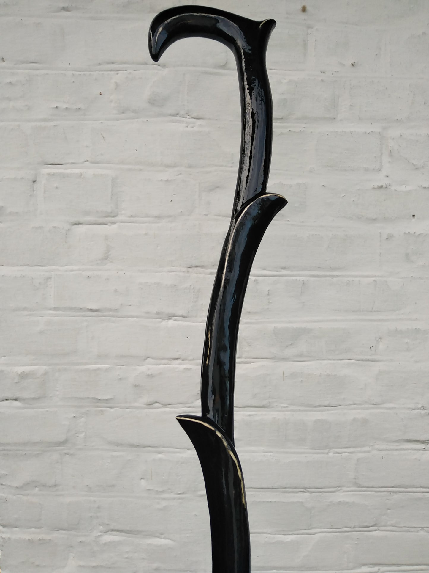 Carved unique wooden cane in the form of a plant