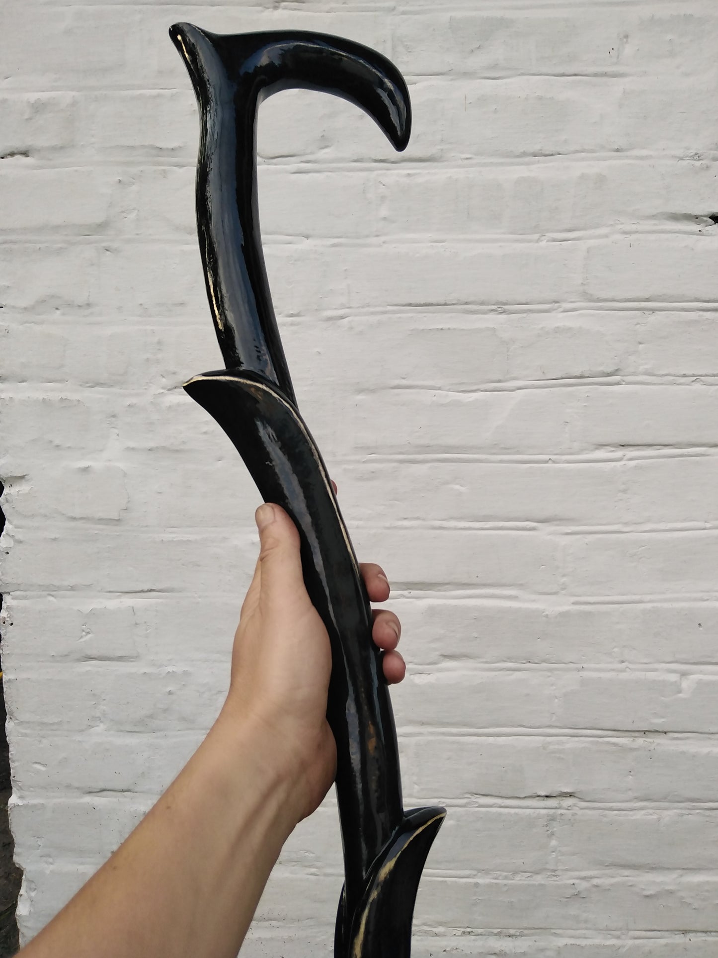 Carved unique wooden cane in the form of a plant