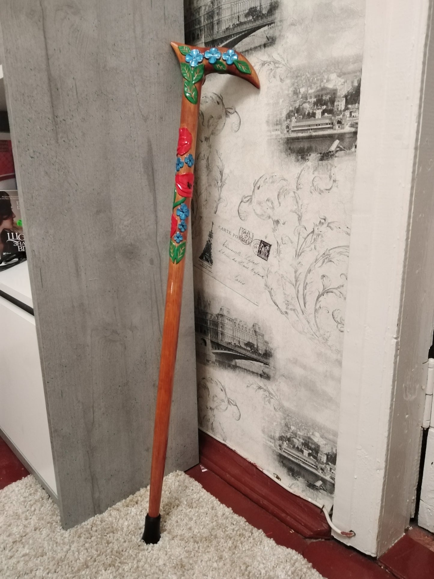 Carved wooden flower cane with poppies