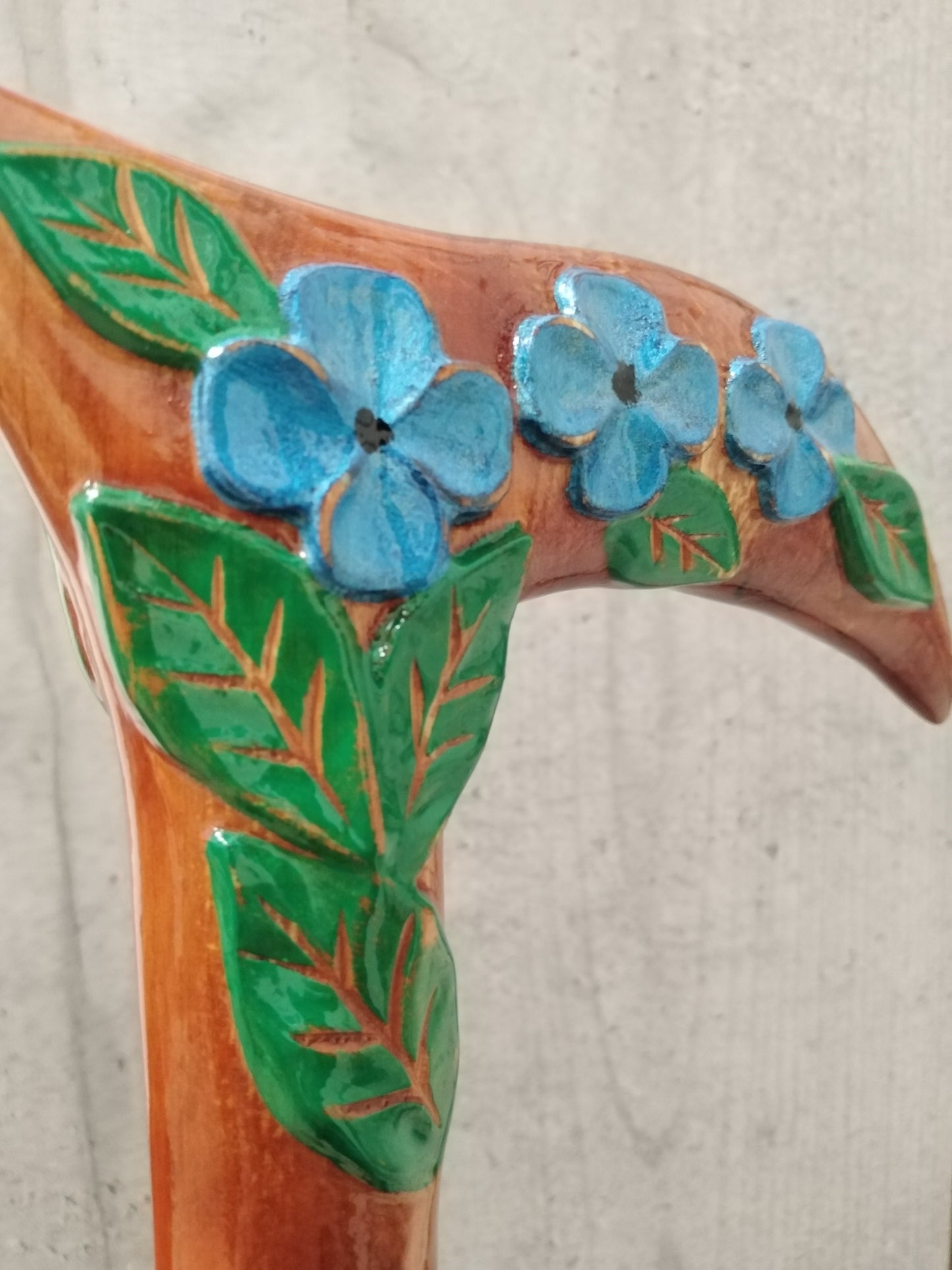 Carved wooden flower cane with poppies
