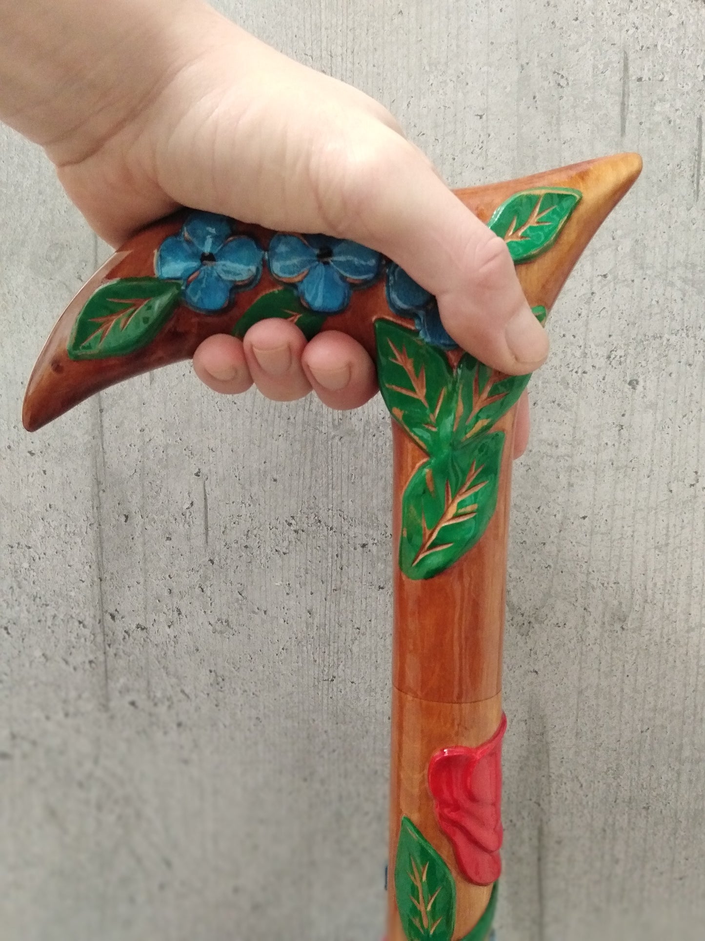 Carved wooden flower cane with poppies