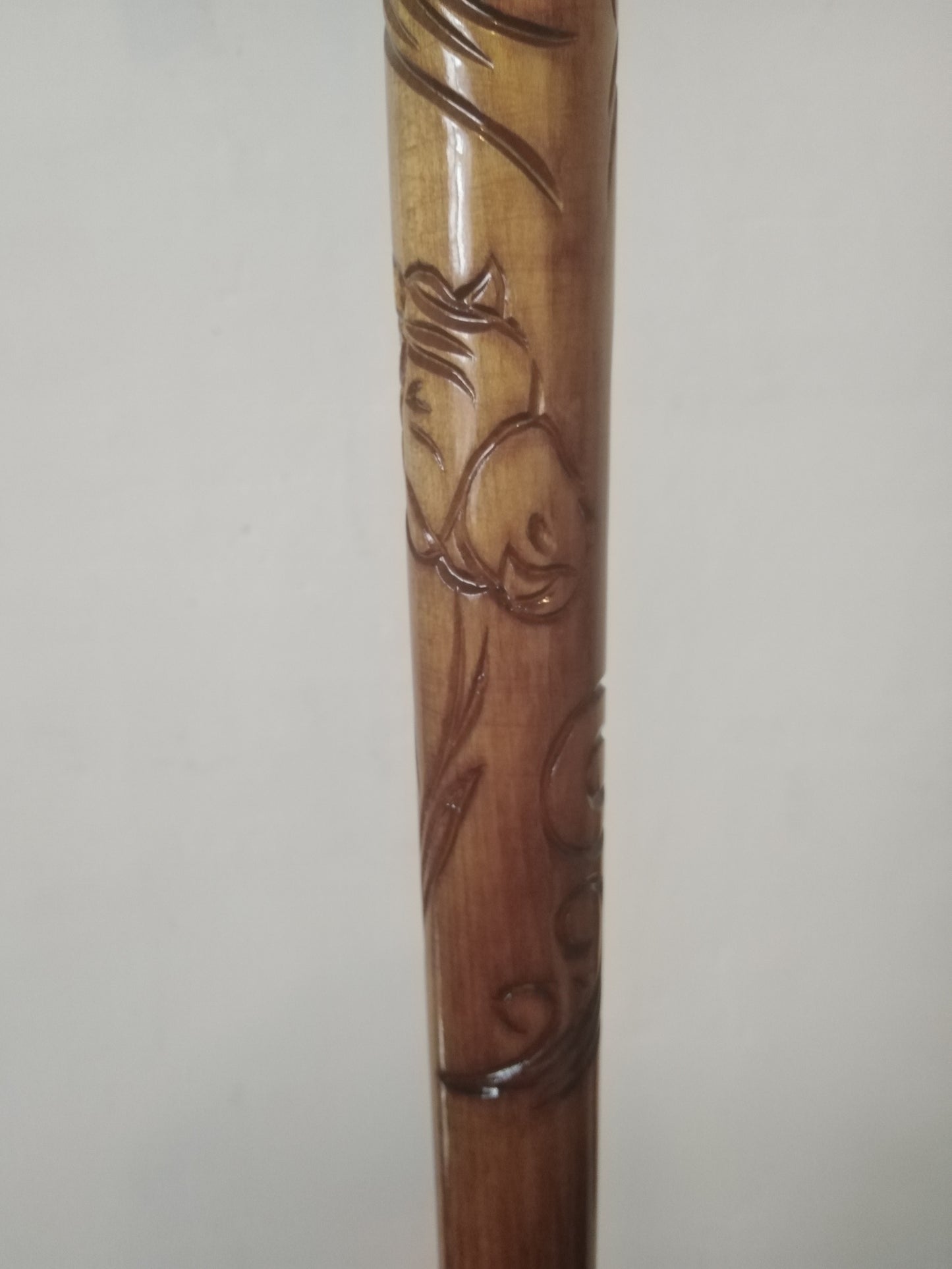 Carved wooden cane with a horse