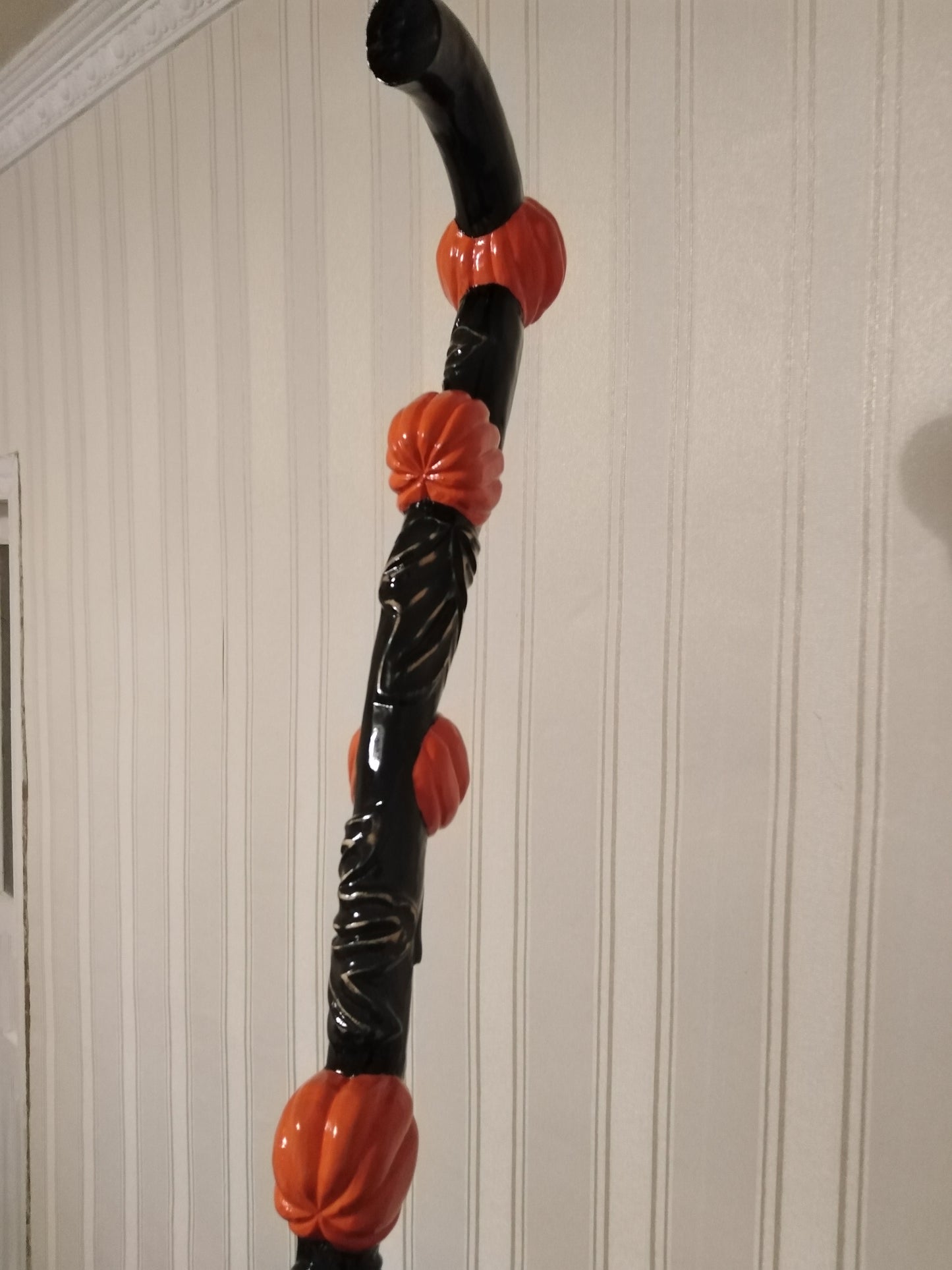 Carved wooden cane with pumpkins