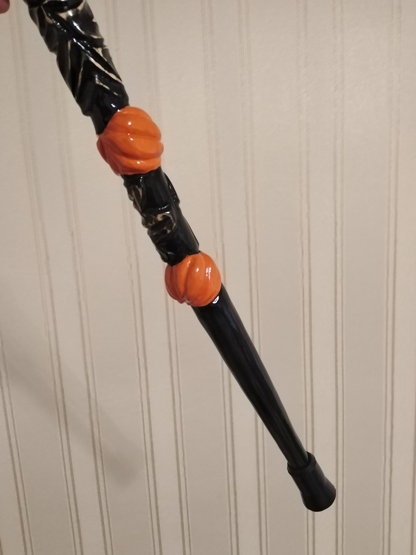 Carved wooden cane with pumpkins