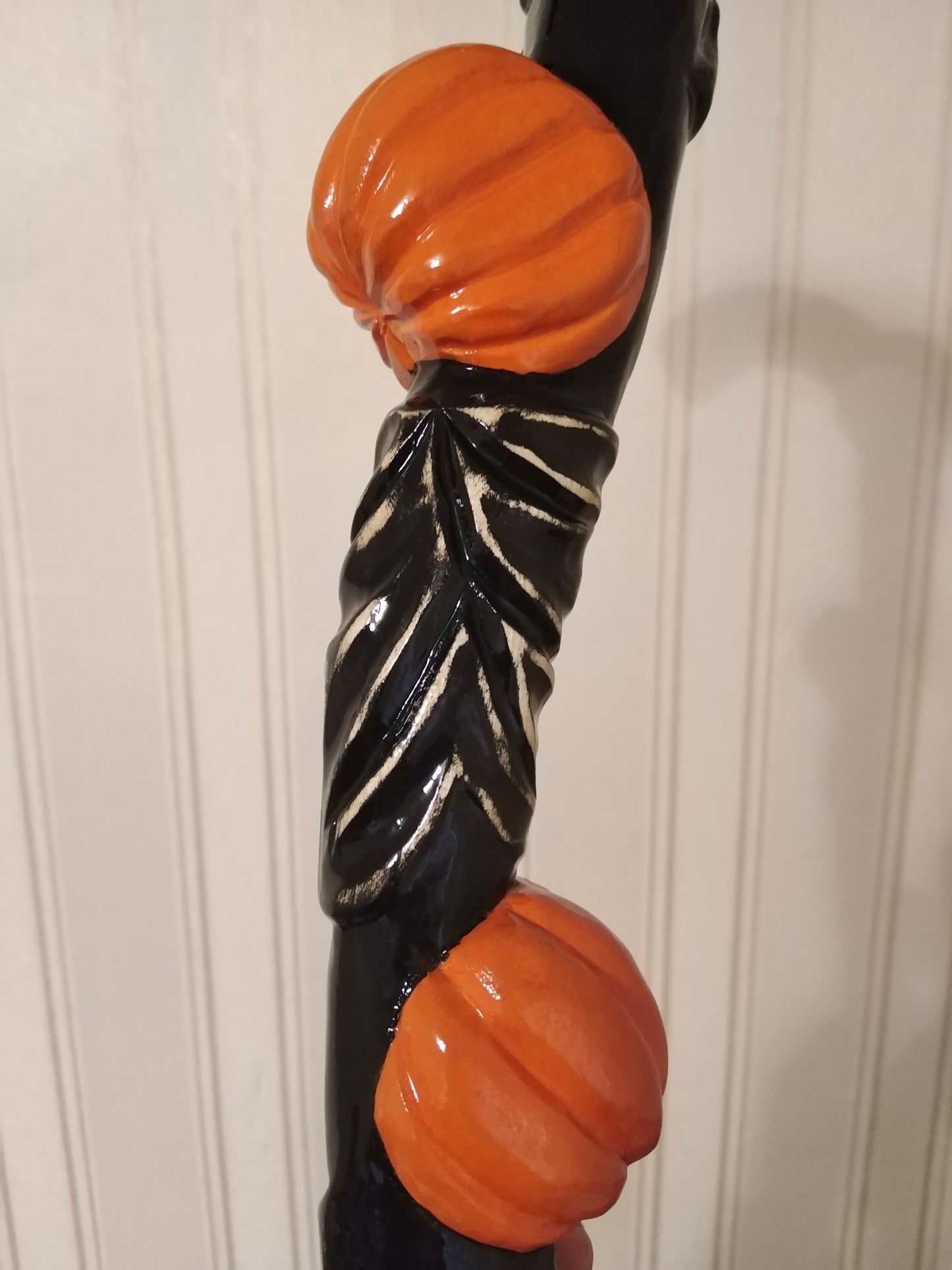 Carved wooden cane with pumpkins