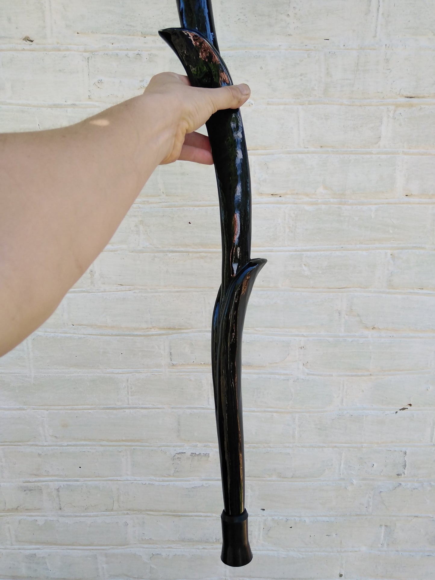 Carved wooden cane with a crow