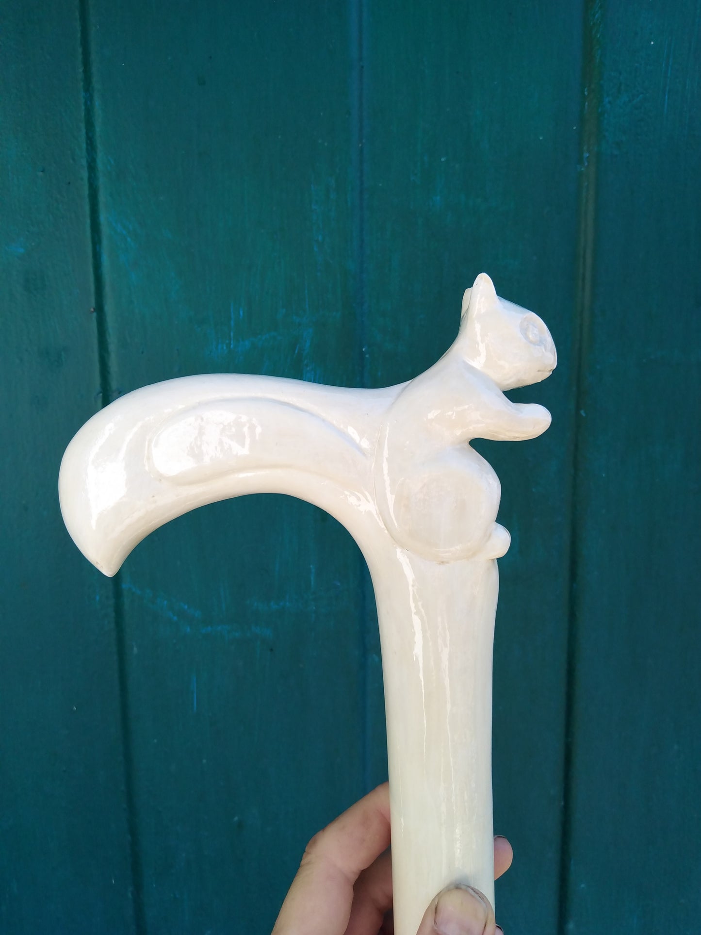 Carved wooden cane with a squirrel