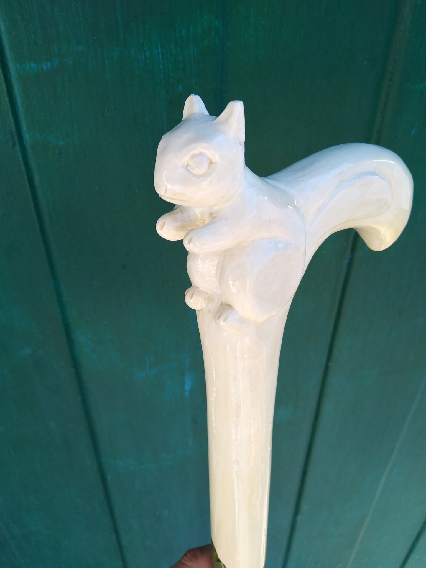 Carved wooden cane with a squirrel