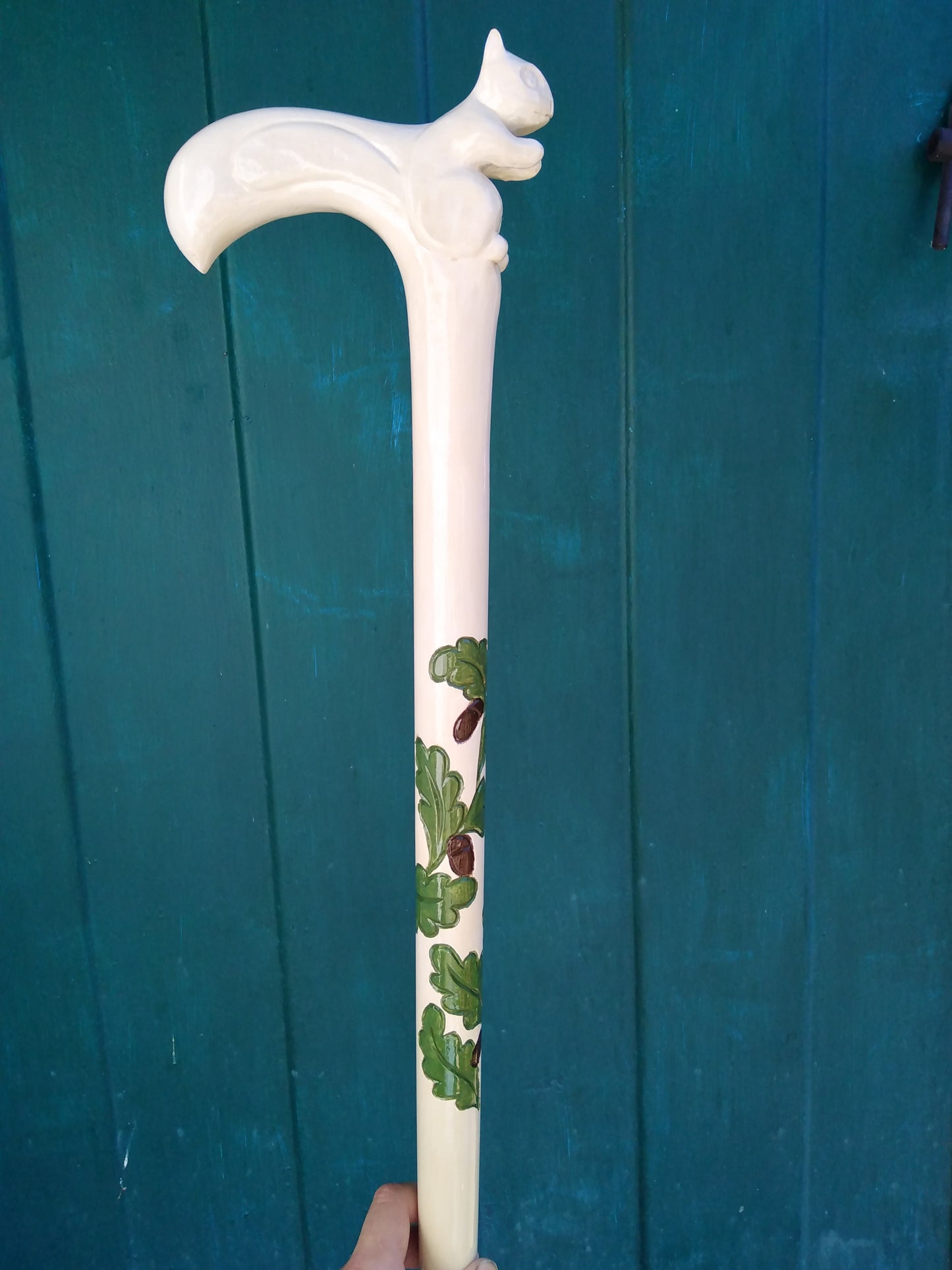 Carved wooden cane with a squirrel