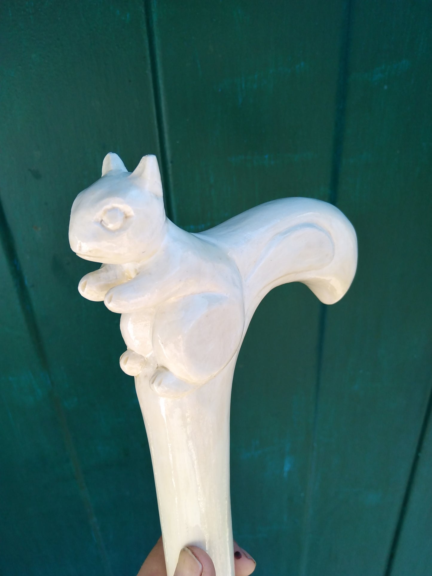 Carved wooden cane with a squirrel