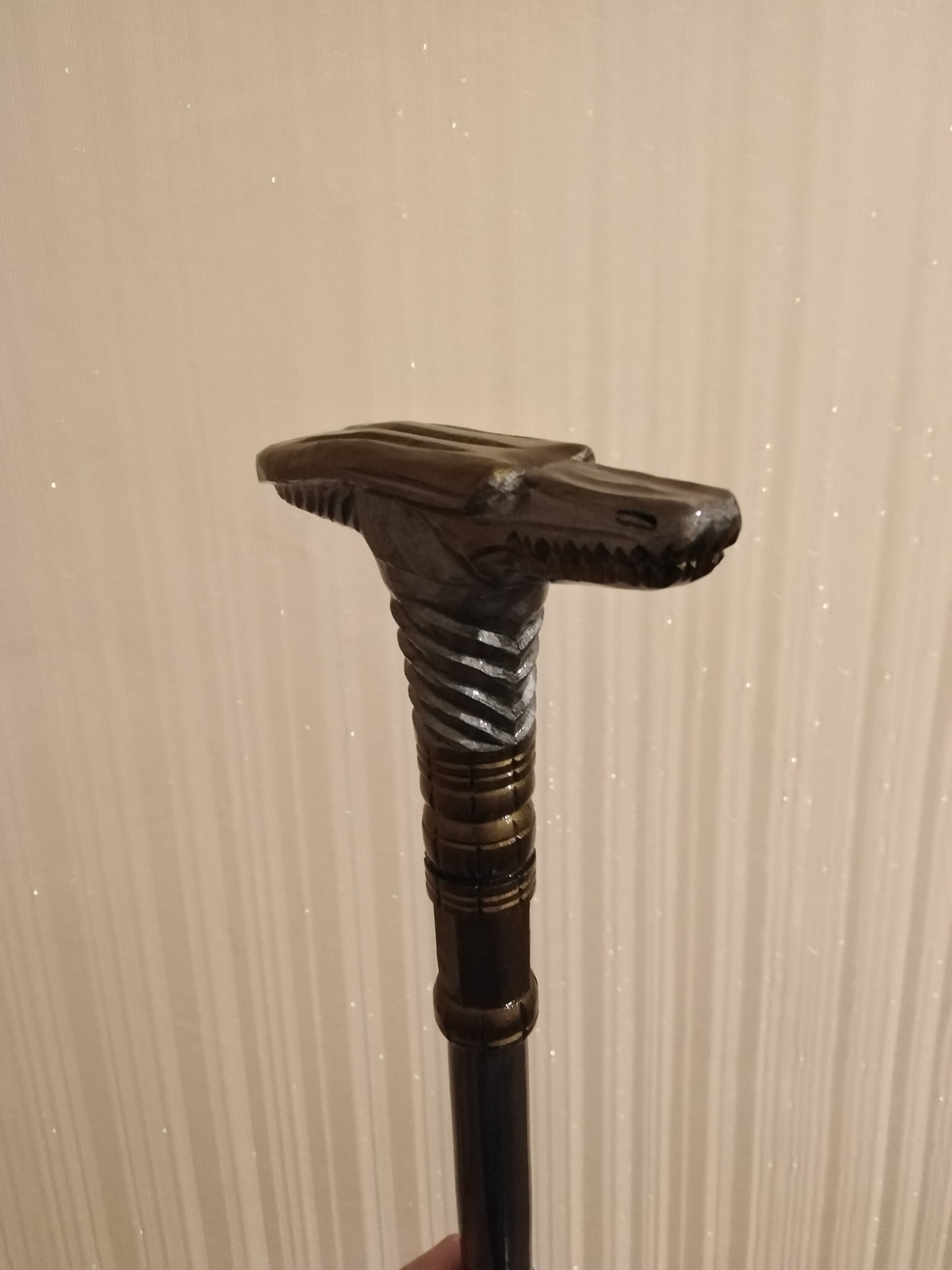 Carved wooden cane in Egyptian style