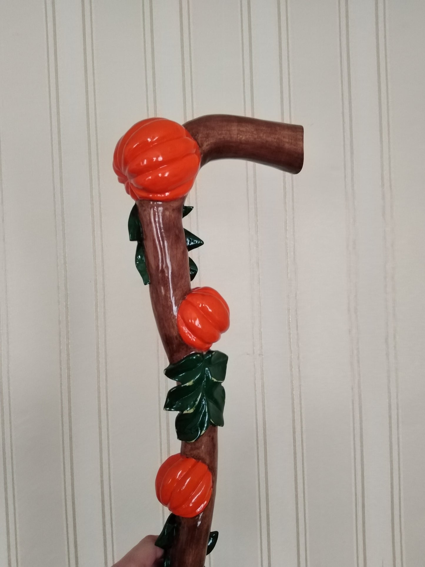 Carved wooden cane with pumpkins