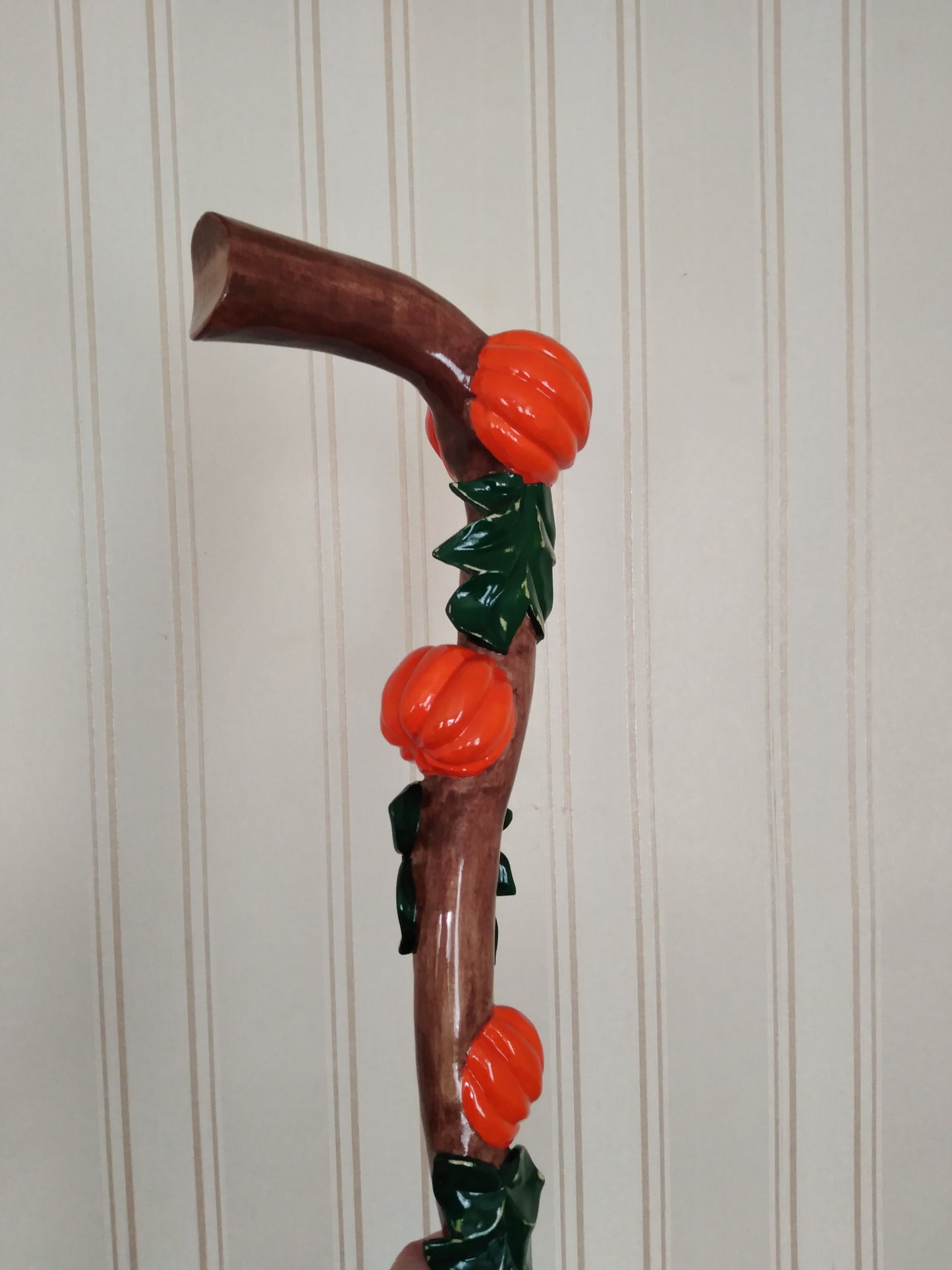 Carved wooden cane with pumpkins