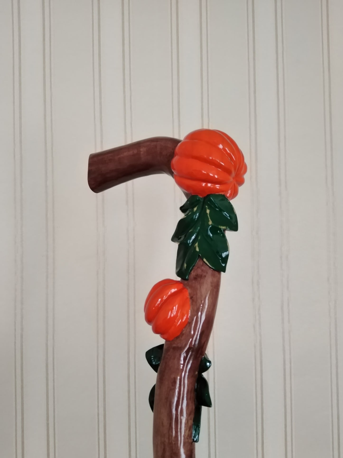 Carved wooden cane with pumpkins