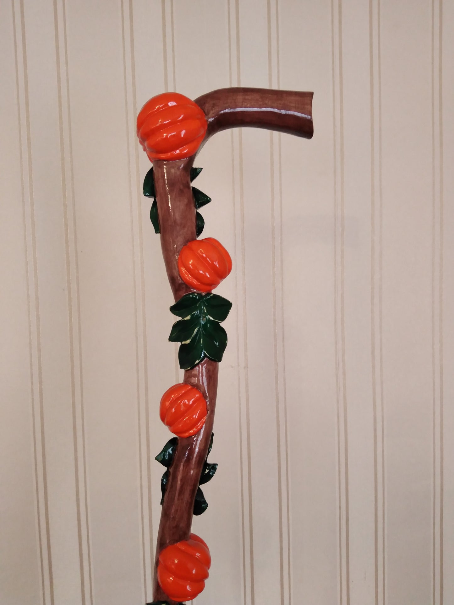 Carved wooden cane with pumpkins