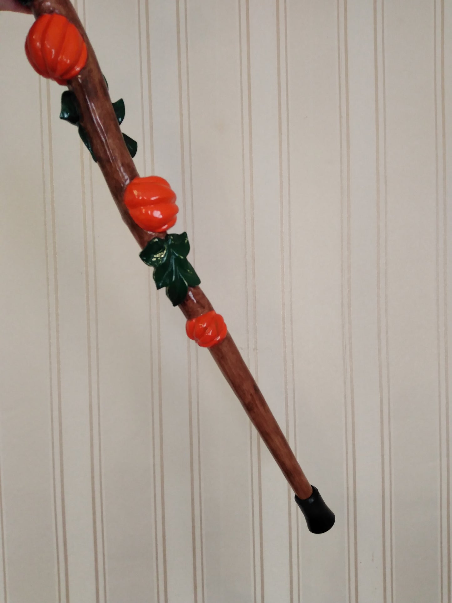 Carved wooden cane with pumpkins