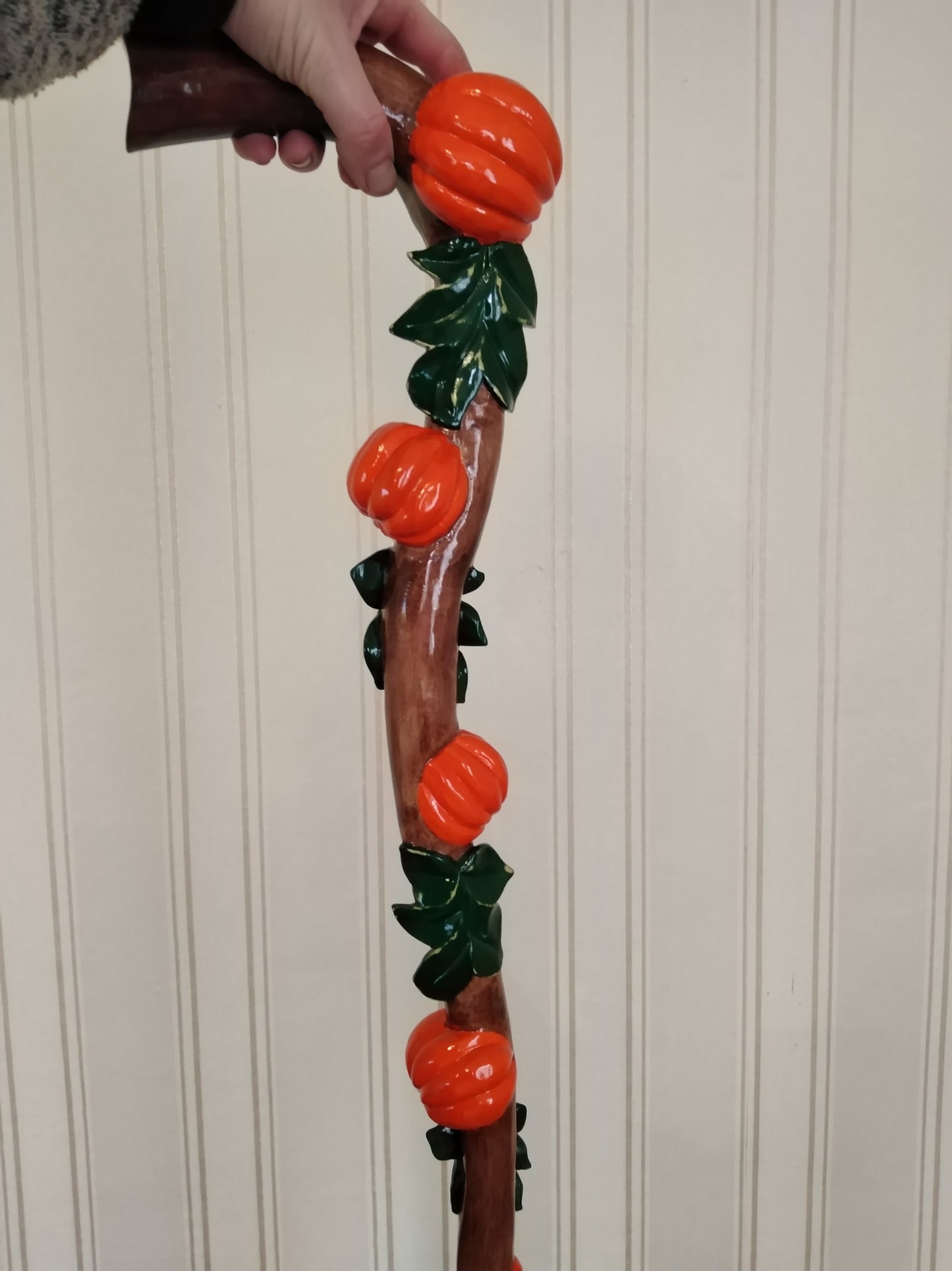 Carved wooden cane with pumpkins