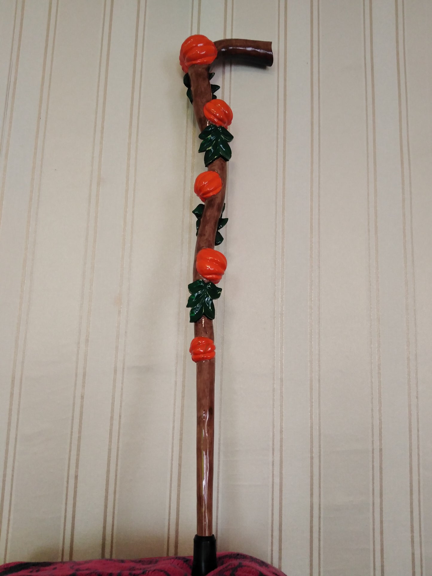 Carved wooden cane with pumpkins