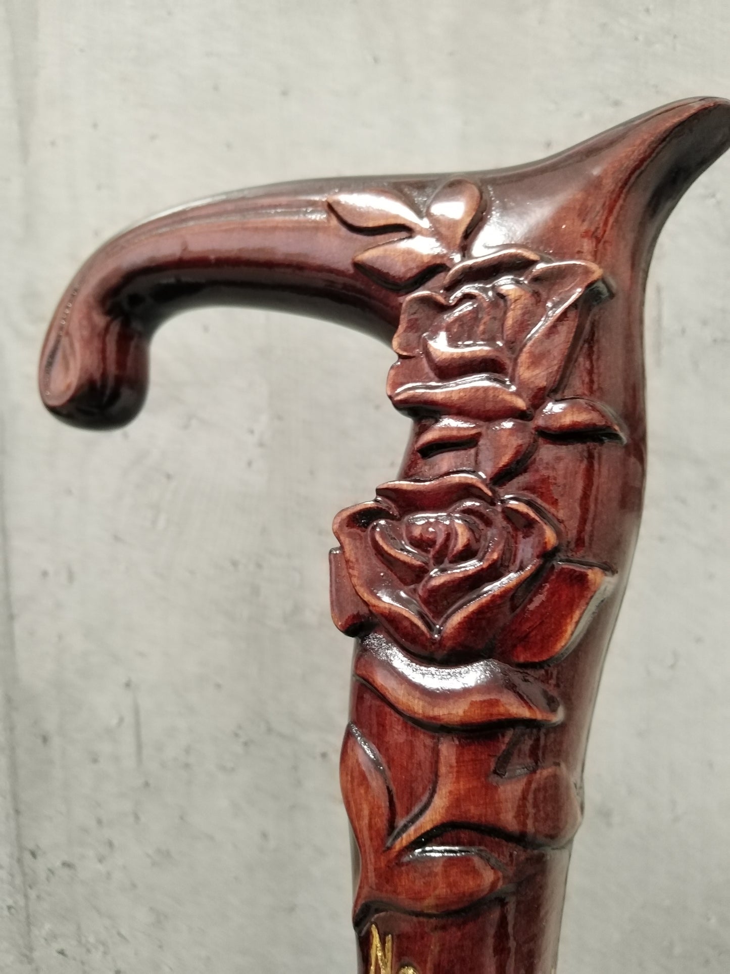 Carved wooden cane with roses