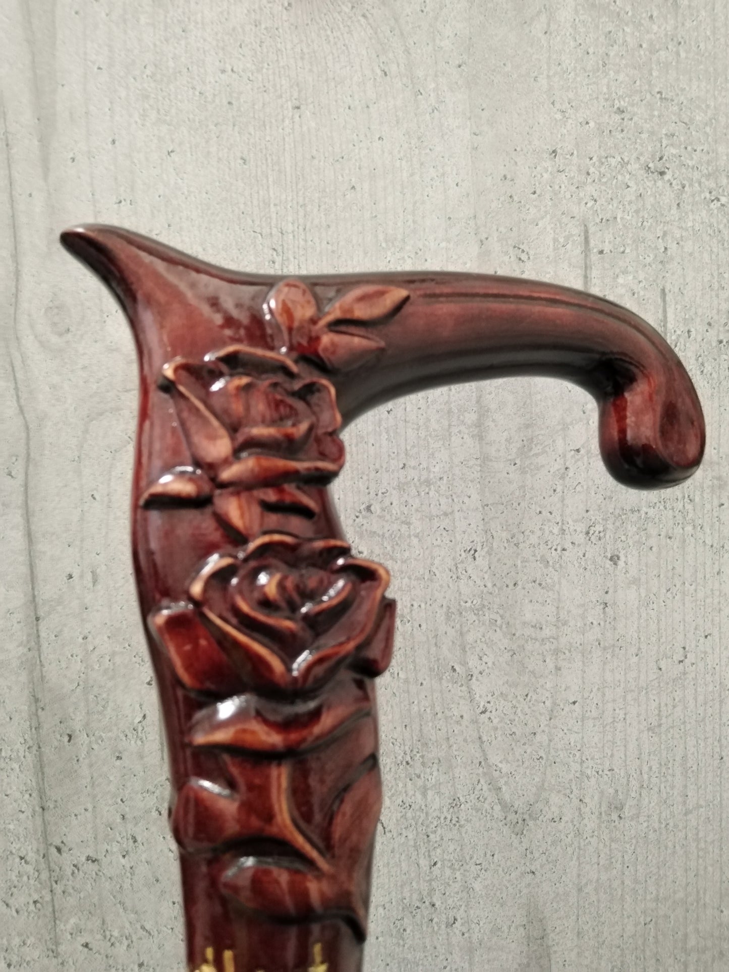 Carved wooden cane with roses