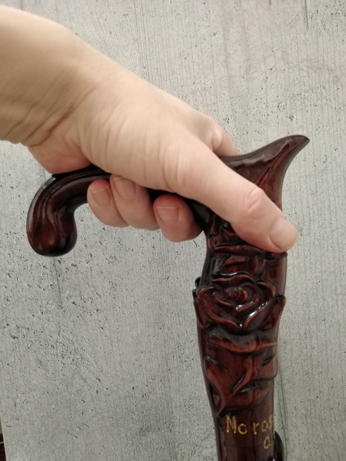 Carved wooden cane with roses