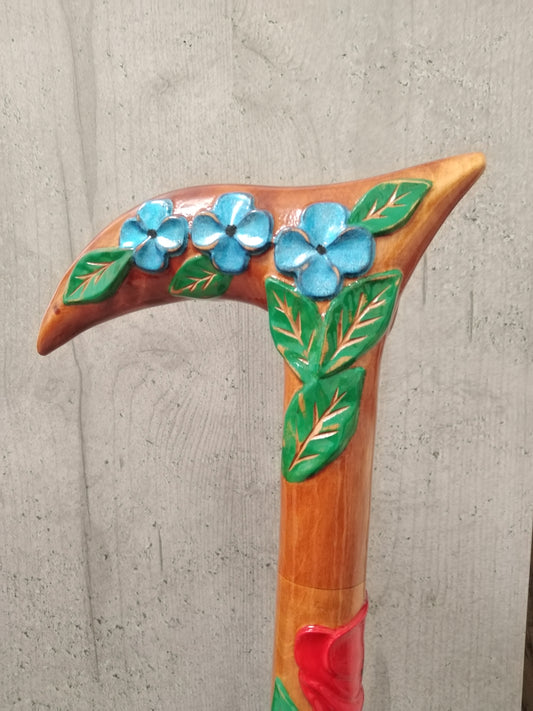 Carved wooden flower cane with poppies